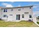 Exterior view of the backyard showcasing the patio area and privacy fence at 14734 Tamarack Dr, Charlotte, NC 28278
