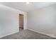 View of the light and airy bedroom with carpeted floors at 14734 Tamarack Dr, Charlotte, NC 28278