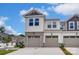 Lovely townhome with neutral colors, a spacious driveway, and appealing curb appeal at 14734 Tamarack Dr, Charlotte, NC 28278