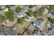 Aerial view of neighborhood featuring large lots, mature trees, well-maintained homes, and privacy fences at 152 Painted Bunting Dr, Troutman, NC 28166