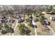 Aerial view of neighborhood featuring well-maintained homes, mature trees, and manicured lawns at 152 Painted Bunting Dr, Troutman, NC 28166