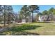 Spacious two-story home with well-maintained lawn, attached garage, and long driveway at 152 Painted Bunting Dr, Troutman, NC 28166