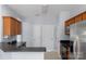 Well-equipped kitchen features stainless steel appliances and convenient breakfast bar at 152 Painted Bunting Dr, Troutman, NC 28166
