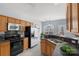 Functional kitchen equipped with stainless steel appliances and ample counter space at 152 Painted Bunting Dr, Troutman, NC 28166