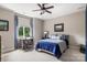 Inviting bedroom featuring ample natural light, a comfortable bed, and a functional workspace at 16824 Ashton Oaks Dr, Charlotte, NC 28278