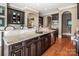 Spacious kitchen with custom cabinetry, granite countertops, and stainless steel appliances at 16824 Ashton Oaks Dr, Charlotte, NC 28278
