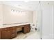 Spacious bathroom with a vanity, marble countertops, toilet, and glass-enclosed shower, exuding comfort and functionality at 171 Agnew Rd, Mooresville, NC 28117