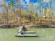 Private dock on a serene lake, perfect for boating and enjoying nature at 171 Agnew Rd, Mooresville, NC 28117