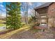 Waterfront home featuring a screened porch, lower patio, and views of the lake at 171 Agnew Rd, Mooresville, NC 28117