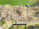 Aerial of a 0.68 acre wooded lot with lake access and approximate land lines at 171 Agnew Rd, Mooresville, NC 28117