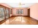 Bright and airy living room with hardwood floors, bay window, and access to the deck at 171 Agnew Rd, Mooresville, NC 28117