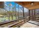 Cozy covered porch with a wooded view, offering a peaceful outdoor retreat at 171 Agnew Rd, Mooresville, NC 28117