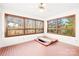 Bright sunroom featuring brick floors and multiple windows, offering a warm and inviting space with outdoor views at 171 Agnew Rd, Mooresville, NC 28117