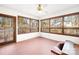 Bright sunroom featuring brick floors and multiple windows, offering a warm and inviting space with outdoor views at 171 Agnew Rd, Mooresville, NC 28117