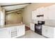 Modern kitchen with granite countertops, white cabinets, and open access to the adjacent living area at 1780 Lumpkin Cir, Rock Hill, SC 29732