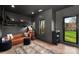 Contemporary gray bedroom with a bunk bed, leather couch, and modern rug at 180 Willow Point Rd, Troutman, NC 28166