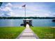Lakefront property with a private dock featuring a boat lift, on a beautiful lake at 180 Willow Point Rd, Troutman, NC 28166