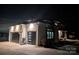 The exterior features an attached garage with modern doors and a basketball hoop, enhancing the home's curb appeal at 180 Willow Point Rd, Troutman, NC 28166