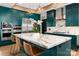 Stylish kitchen featuring a large marble island, dark green cabinets, modern appliances, and elegant pendant lighting at 180 Willow Point Rd, Troutman, NC 28166