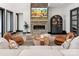 Cozy living room features a stone fireplace and comfortable seating at 180 Willow Point Rd, Troutman, NC 28166