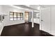 Finished basement with dark hardwood flooring, ample natural light, and a partial kitchenette at 1888 Usher Rd, Lancaster, SC 29720