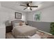 This bedroom features stylish decor, a ceiling fan, and a soft, inviting bed at 1888 Usher Rd, Lancaster, SC 29720