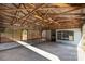 View of the covered parking area with a lattice and exposed wood beam ceiling at 1888 Usher Rd, Lancaster, SC 29720