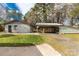 Exterior view of home featuring covered parking, garage and partially fenced yard at 1888 Usher Rd, Lancaster, SC 29720