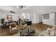Bright living room boasts wood floors, neutral decor, and an open layout perfect for modern living at 1888 Usher Rd, Lancaster, SC 29720