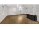 Bright, open living room with a bar, fan, and ample natural light at 1888 Usher Rd, Lancaster, SC 29720