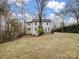 Backyard featuring an outdoor seating area and a lush green lawn at 199 Ingleside Se Dr, Concord, NC 28025