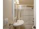 Bathroom with a pedestal sink, tile floors, and shower at 2125 Shenandoah Ave, Charlotte, NC 28205