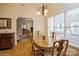 Dining room with hardwood floors and view to the living room at 2125 Shenandoah Ave, Charlotte, NC 28205