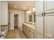 An elegant bathroom includes a double vanity and walk-in shower at 2125 Shenandoah Ave, Charlotte, NC 28205