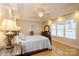 Bright bedroom features hardwood floors, tray ceilings, and neutral walls at 2125 Shenandoah Ave, Charlotte, NC 28205