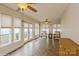 Bright sun room with tile floors, ceiling fans, and many windows at 2125 Shenandoah Ave, Charlotte, NC 28205