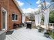 Backyard deck featuring an outdoor grill, outdoor seating, and curtained pergola at 255 Morrow Ne Ct, Concord, NC 28025