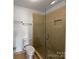 Bathroom featuring a glass shower, neutral walls, and tile flooring at 26017 Misty Way Dr, Fort Mill, SC 29708