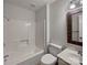 Bathroom featuring a shower-tub combo, neutral walls, and tiled floors at 26017 Misty Way Dr, Fort Mill, SC 29708