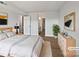 Serene primary bedroom showcasing a neutral color palette and access to the ensuite bathroom at 26017 Misty Way Dr, Fort Mill, SC 29708