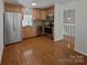 Updated kitchen with stainless steel appliances, granite countertops, and hardwood floors at 26017 Misty Way Dr, Fort Mill, SC 29708
