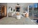 Staged living room featuring a fireplace with built-in shelves and a sliding glass door to the deck at 26017 Misty Way Dr, Fort Mill, SC 29708