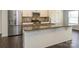 Modern kitchen with granite countertops and stainless steel appliances at 2692 Norman Isle Dr, Denver, NC 28037