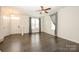 Sun-filled living room boasting hardwood floors and an open layout at 2692 Norman Isle Dr, Denver, NC 28037