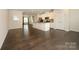 Spacious living area with an open kitchen and hardwood floors at 2692 Norman Isle Dr, Denver, NC 28037