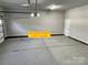 Spacious two-car garage with plenty of room for storage and parking at 309 General As Johnston St, Stanley, NC 28164