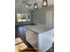 Kitchen island with grey countertop with open floorplan at 309 General As Johnston St, Stanley, NC 28164