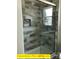 Shower with horizontal marble tile and shampoo nook at 309 General As Johnston St, Stanley, NC 28164