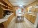 Traditional kitchen with ample cabinet space, a dining area, and modern appliances for convenient meal preparation at 32341 Speiss Rd, Albemarle, NC 28001
