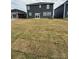 Expansive backyard with newly installed sod, providing ample space for outdoor activities at 330 Knotty Wood Dr # 67, Monroe, NC 28110